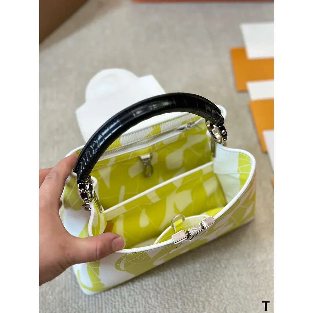 Louis capucines new arrival bag