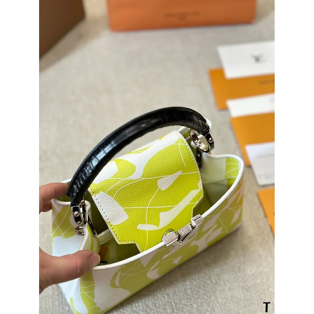 Louis capucines new arrival bag