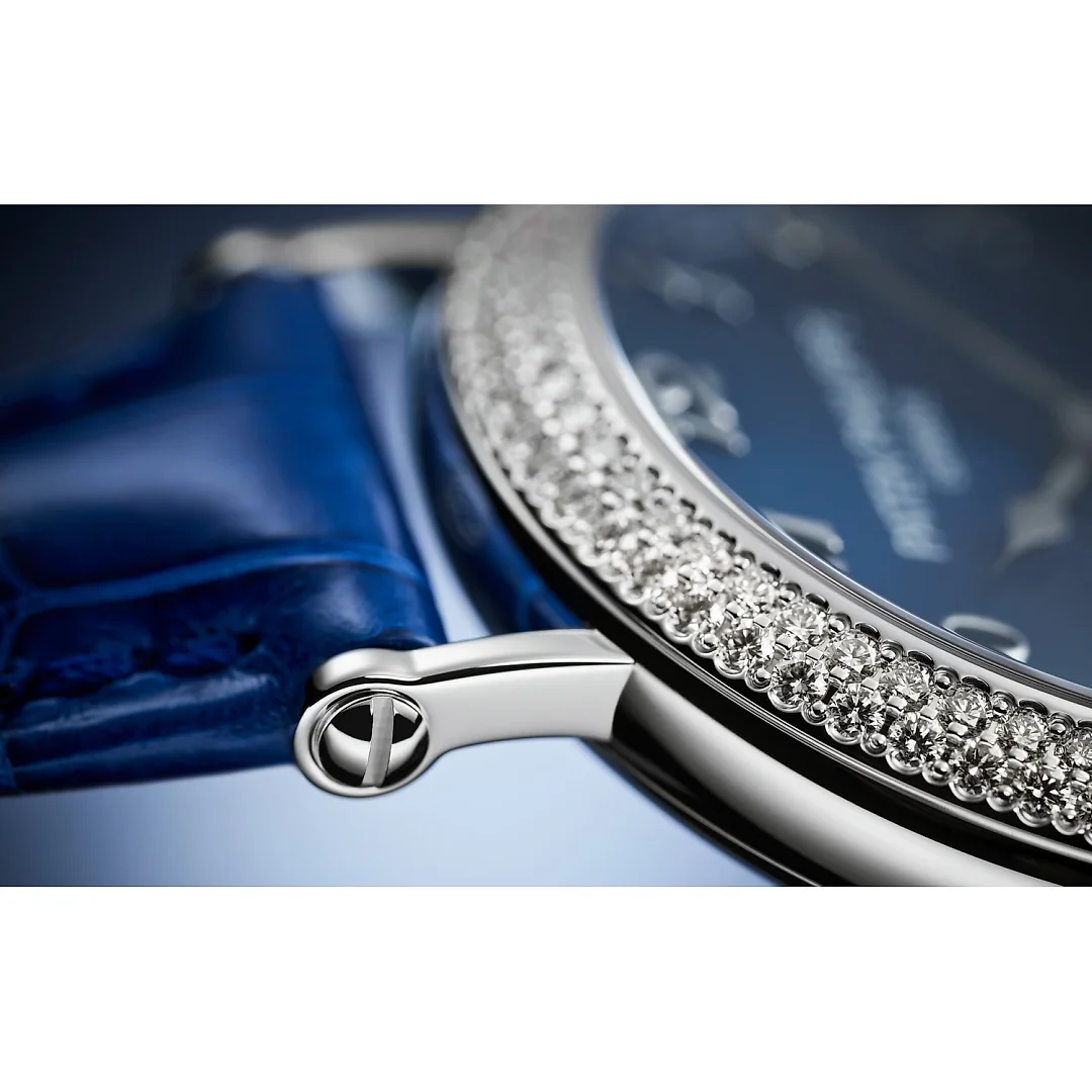 Patek Philippe Complication Moon Phases, 18k White Gold with 132 (~1.09 cts.) brilliant-cut diamonds, 33mm, Ref# 7121/200G-001