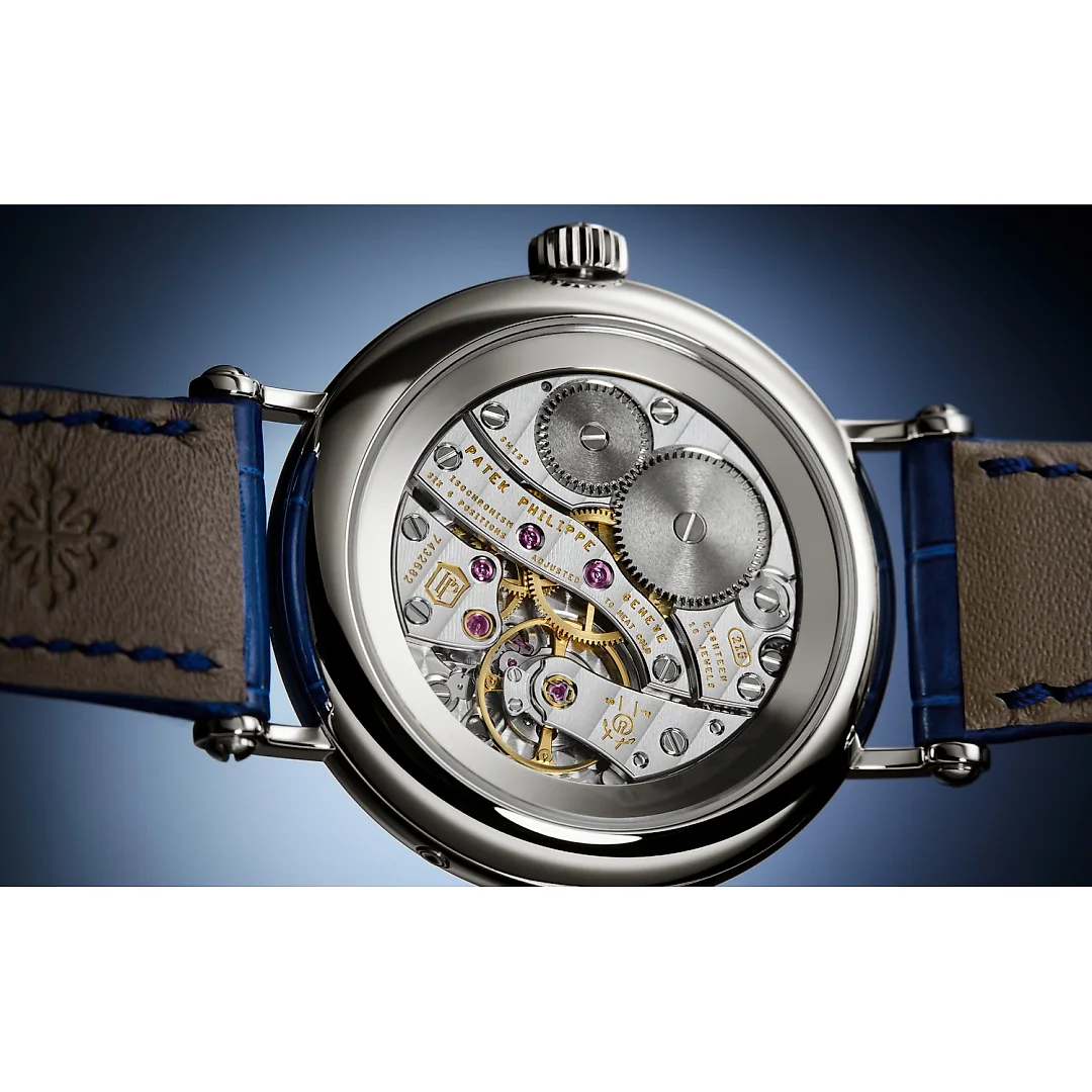 Patek Philippe Complication Moon Phases, 18k White Gold with 132 (~1.09 cts.) brilliant-cut diamonds, 33mm, Ref# 7121/200G-001
