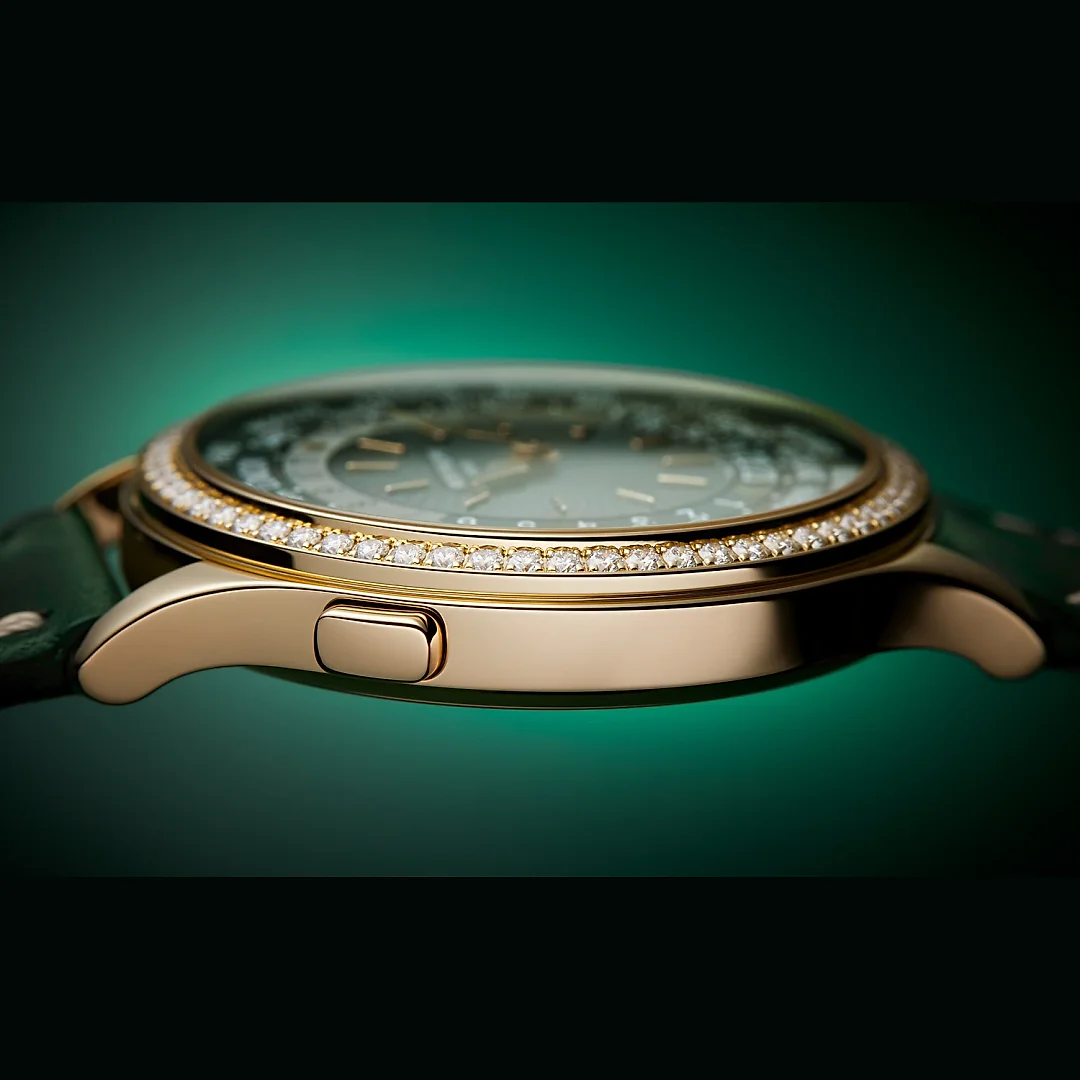 Patek Philippe Women’s Complication World-Time, 18k Rose Gold set with 89 diamonds (~1.03 ct.), 36mm, Ref# 7130R-014