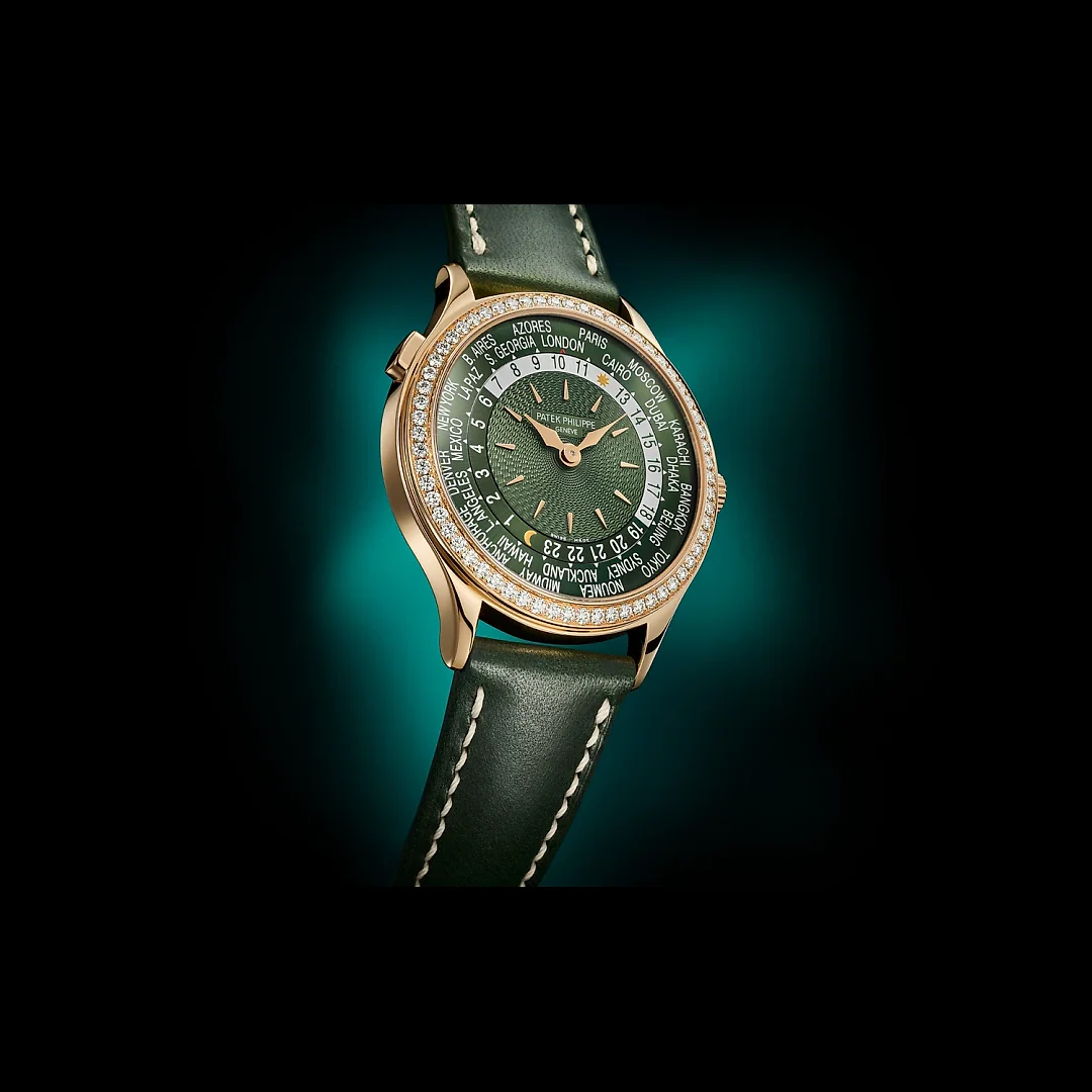 Patek Philippe Womenâ€™s Complication World-Time, 18k Rose Gold set with 89 diamonds (~1.03 ct.), 36mm, Ref# 7130R-014