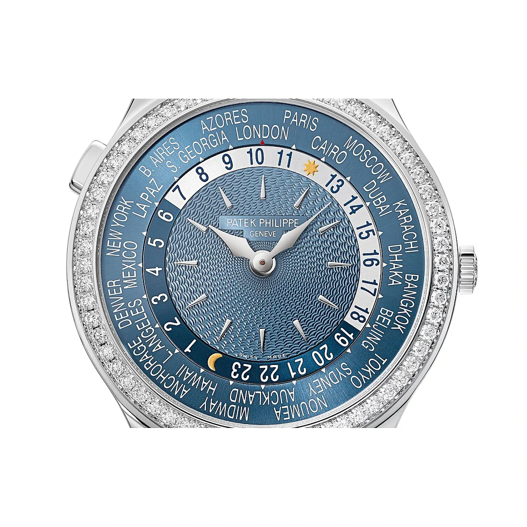 Patek Philippe Women’s Complication World-Time, 18k White Gold set with 89 diamonds (~1.03 ct.), 36mm, Ref# 7130G-016